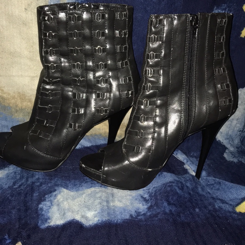 Michael Antonio black zip up, chain linked booties
